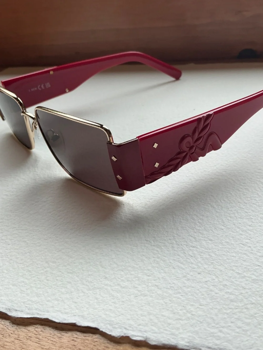 MCM Red and Gold Shield Sunglasses with crossbody case